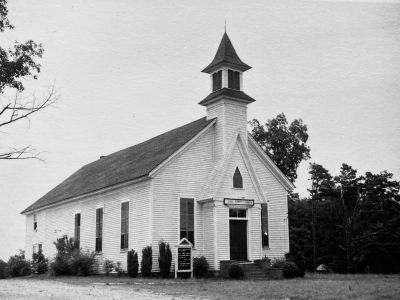 Building constructed in 1896 when the church relocated to Hull. Ths photo includes a Sunday School addition which was completed in 1942